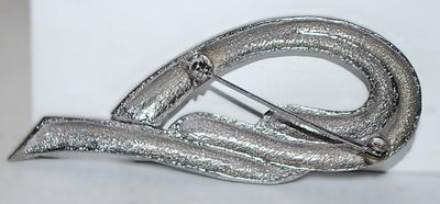 Three Point Silver Colored SWIRL BROOCH (3' x 1¼") on a Silver Tone Setting