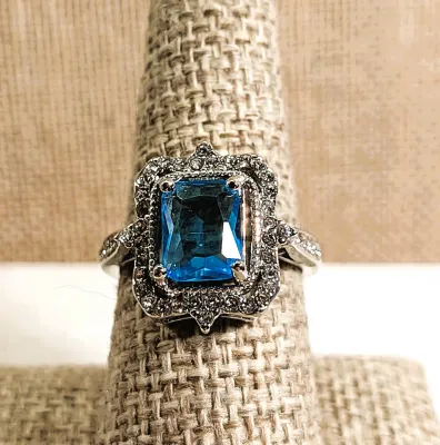 **New Arrival** Size 7¾ Large BLUE Transparent Rectangle Stone RING with Bejeweled Surround on a "Nest" and Jeweled Side Band...