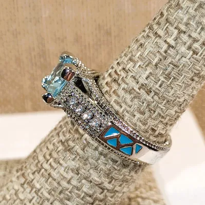 **New Arrival** Size 7¼ Light BLUE Main Transparent Stone RING with Jeweled Side Accents and Enameled Design on a Silver Tone Setting...