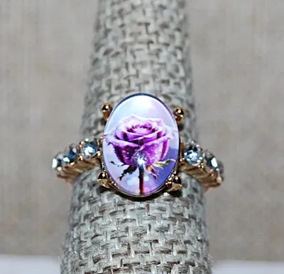 **NEW ARRIVAL** Size 6¾ Oval "PURPLE ROSE WINDOW" RING with Triple Clear Stones Side Accents on a Gold Tone Setting and Band...