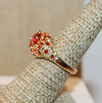 Size 7 Beautiful Bejeweled RED RING with Large Pink/Red Round Stone and Red & Clear Surround and Accent Stones on a Gold Tone Setting...