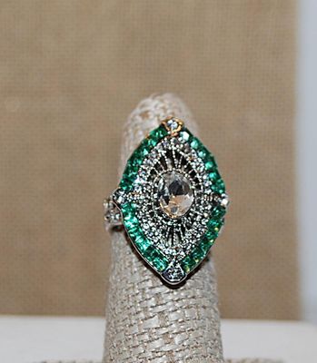Size 6½ Pointed Oval "Party" Style RING with Green Perimeter Stones, Clear Accents Stones and Filagree Center on a Silver Tone...