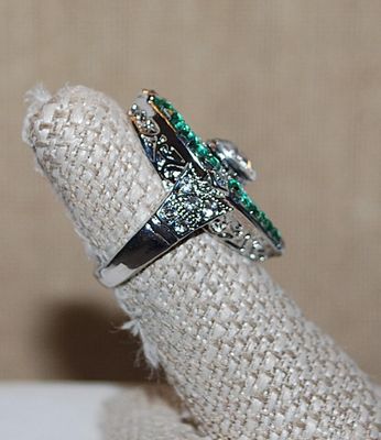 Size 6½ Pointed Oval "Party" Style RING with Green Perimeter Stones, Clear Accents Stones and Filagree Center on a Silver Tone...