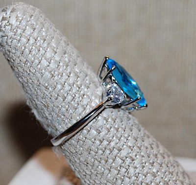 Size 8 Long Marquise Cut Light BLUE Main Stone RING with 2 Clear HEART Shaped Accent Stones on a Silver Tone Setting and Band (3.2g)