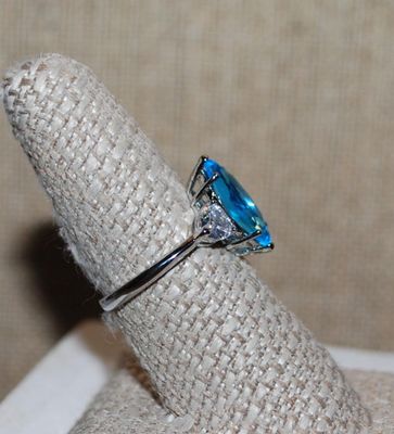 Size 8 Long Marquise Cut Light BLUE Main Stone RING with 2 Clear HEART Shaped Accent Stones on a Silver Tone Setting and Band (3.2g)
