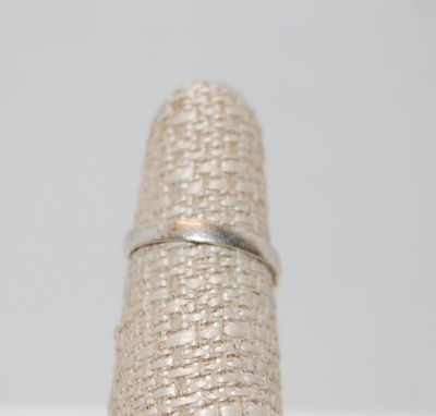 Size 6¼ Solitaire Clear Stone with "Wrap-a-Round" Silver Tone Band (2.4g)