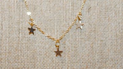 7 Dainty "Gold" Stars Necklace 14" L