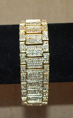 ***NEW SALE PRICE*** Beautiful Gold Tone JEWEL STUDDED BRACELET (2¼" Opening) with Half Infinity Clear Stone Segments &...