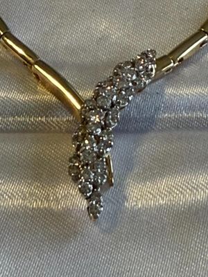 LADIES ESTATE 14K YELLOW GOLD NEVER WORN 18" DIAMOND V-SHAPED NECKLACE 15.4 PENNYWEIGHTS AND APPROX 1-CARAT DIAMONDS.