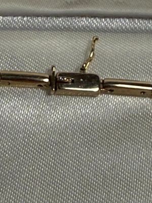 LADIES ESTATE 14K YELLOW GOLD NEVER WORN 18" DIAMOND V-SHAPED NECKLACE 15.4 PENNYWEIGHTS AND APPROX 1-CARAT DIAMONDS.