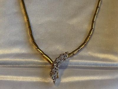 LADIES ESTATE 14K YELLOW GOLD NEVER WORN 18" DIAMOND V-SHAPED NECKLACE 15.4 PENNYWEIGHTS AND APPROX 1-CARAT DIAMONDS.
