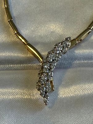 LADIES ESTATE 14K YELLOW GOLD NEVER WORN 18" DIAMOND V-SHAPED NECKLACE 15.4 PENNYWEIGHTS AND APPROX 1-CARAT DIAMONDS.