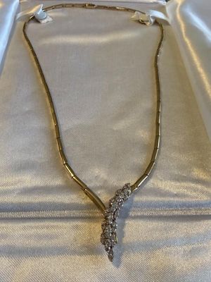 LADIES ESTATE 14K YELLOW GOLD NEVER WORN 18" DIAMOND V-SHAPED NECKLACE 15.4 PENNYWEIGHTS AND APPROX 1-CARAT DIAMONDS.