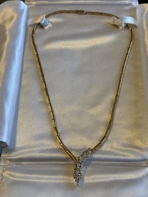 LADIES ESTATE 14K YELLOW GOLD NEVER WORN 18" DIAMOND V-SHAPED NECKLACE 15.4 PENNYWEIGHTS AND APPROX 1-CARAT DIAMONDS.