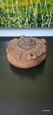 Sale Photo Thumbnail #219: Vintage hand carved wooden Grole, made from mahogany with an elaborate organic floral design. There are five carved outlets about the perimeter allowing various people to drink from the vessel. This would also make a nice potpourri holder, or for other sc