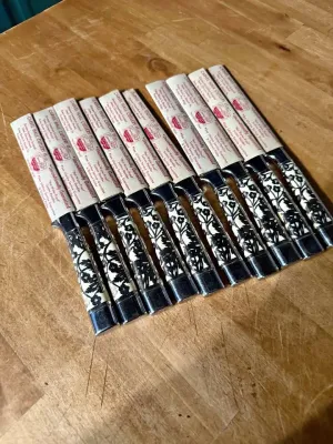 Sale Photo Thumbnail #171: .Beautiful set of 10 vintage mid-century modern steak knives made by Carvel Hall (Briddell). These feature a gorgeous, detailed metal floral overlay pattern on the handles.

Excellent vintage condition with minimal wear. 2 knives show small wear on the ha