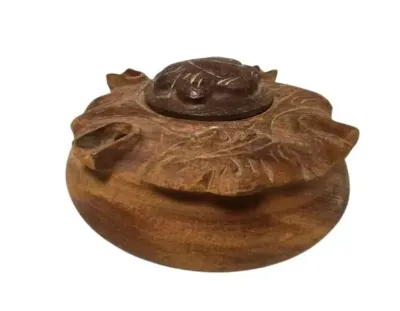Sale Photo Thumbnail #396: Vintage hand carved wooden mahogany Grole elaborate organic floral design potpourri holder
Vintage hand carved wooden Grole, made from mahogany with an elaborate organic floral design. There are five carved outlets about the perimeter allowing various peo