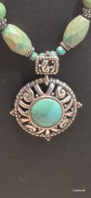 Sale Photo Thumbnail #436: Showcase Southwestern style with this Barse sterling silver necklace featuring genuine turquoise beads, ornate sterling accents, and a bold turquoise pendant that makes a striking statement with both casual and dressy looks.

Stamped Barse 925
16” plus 