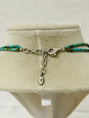 Sale Photo Thumbnail #445: Showcase Southwestern style with this Barse sterling silver necklace featuring genuine turquoise beads, ornate sterling accents, and a bold turquoise pendant that makes a striking statement with both casual and dressy looks.

Stamped Barse 925
16” plus 