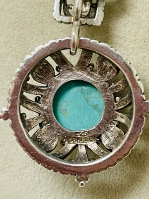 Sale Photo Thumbnail #437: Showcase Southwestern style with this Barse sterling silver necklace featuring genuine turquoise beads, ornate sterling accents, and a bold turquoise pendant that makes a striking statement with both casual and dressy looks.

Stamped Barse 925
16” plus 