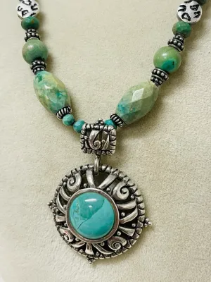 Sale Photo Thumbnail #434: Showcase Southwestern style with this Barse sterling silver necklace featuring genuine turquoise beads, ornate sterling accents, and a bold turquoise pendant that makes a striking statement with both casual and dressy looks.

Stamped Barse 925
16” plus 