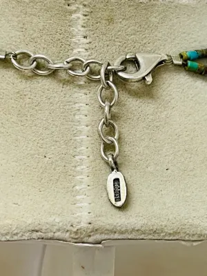 Sale Photo Thumbnail #444: Showcase Southwestern style with this Barse sterling silver necklace featuring genuine turquoise beads, ornate sterling accents, and a bold turquoise pendant that makes a striking statement with both casual and dressy looks.

Stamped Barse 925
16” plus 