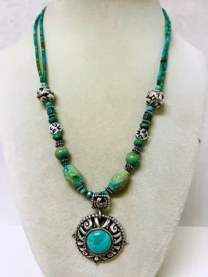 Sale Photo Thumbnail #442: Showcase Southwestern style with this Barse sterling silver necklace featuring genuine turquoise beads, ornate sterling accents, and a bold turquoise pendant that makes a striking statement with both casual and dressy looks.

Stamped Barse 925
16” plus 