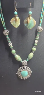 Sale Photo Thumbnail #433: Showcase Southwestern style with this Barse sterling silver necklace featuring genuine turquoise beads, ornate sterling accents, and a bold turquoise pendant that makes a striking statement with both casual and dressy looks.

Stamped Barse 925
16” plus 