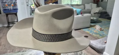 Sale Photo Thumbnail #174: Dynafelft water proof "Stetson Hat" ~ size 7.25
Band and feather are a "yahoo"
Water repellent fur blend is most likely made of wool and rabbit fur blend.
Dynafelft know for top quality line of hats.
There is no sweat on interior, no damage, a small gray 
