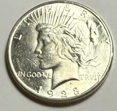 Sale Photo Thumbnail #102: 1923-S UNCIRCULATED CONDITION PEACE SILVER DOLLAR #423 AS PICTURED. $5 DOMESTIC SHIPPING.