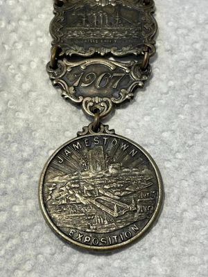 Sale Photo Thumbnail #359: ANTIQUE 1607/1907 JAMESTOWN Ter-Centennial Exposition Silver Watch Fob in Good Preowned Condition. $5 DOMESTIC SHIPPING.