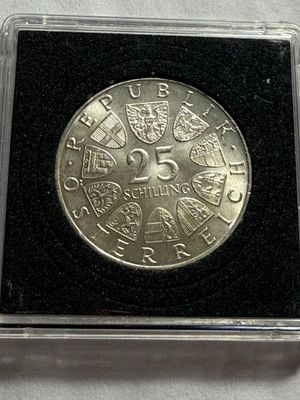 Sale Photo Thumbnail #374: AUSTRIA 1965 UNCIRCULATED 25 SCHILLING SILVER COIN (ASW: 0.3344oz) AS PICTURED.  $5 DOMESTIC SHIPPING.