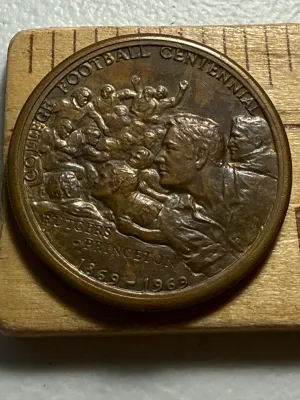 Sale Photo Thumbnail #383: 1969 COLLEGE FOOTBALL CENTENNIAL COIN/MEDAL COMMEMORATING RUTGERS/PRINCETON FOOTBALL RIVALRY. $5 DOMESTIC SHIPPING.