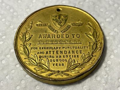 Sale Photo Thumbnail #443: Nottingham School Board Medal 1895 - Exemplary Punctuality Awarded to; F. HUCKNALL Brass Composition as Pictured. (SILVER DOLLAR SIZED MEDAL). $5 DOMESTIC SHIPPING.