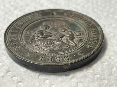 Sale Photo Thumbnail #445: Nottingham School Board Medal 1893 - Exemplary Punctuality Awarded to; F. HUCKNALL Bronze Composition as Pictured. (SILVER DOLLAR SIZED). $5 DOMESTIC SHIPPING.
