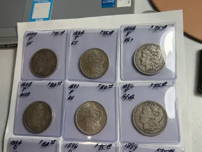 Sale Photo Thumbnail #453: 10 NICE CIRCULATED CONDITION EARLY DATE MORGAN SILVER DOLLARS RECEIVE ALL AS PICTURED. $5 DOMESTIC SHIPPING.