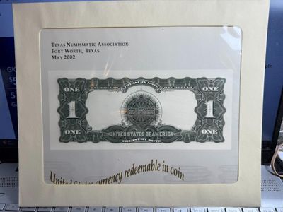 Sale Photo Thumbnail #477: 2002 TEXAS NUMISMATIC ASSOC. $1 SOUVENIR SHOW CURRENCY CARD IN ORIGINAL ENVELOPE AS PICTURED. $5 DOMESTIC SHIPPING.