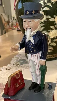 Sale Photo Thumbnail #597: Uncle Sam Mechanical Bank Reproduction in VG Working Order as Pictured. $15 Domestic Shipping.