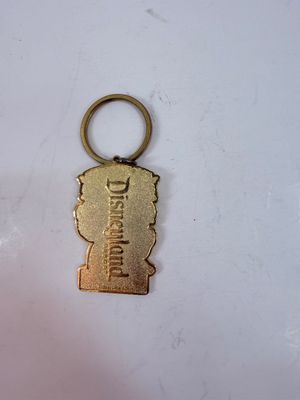 Sale Photo Thumbnail #291: Personalized Disneyland Resort Pirates of the Caribbean metal keychain featuring a pirate-themed Mickey Mouse dressed as Captain Jack Sparrow, with the name "MARIO" customized on the bottom tag.
