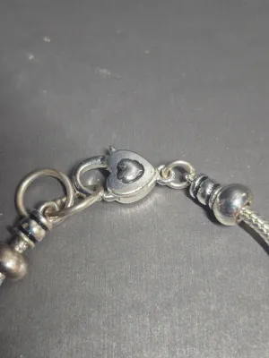 Sale Photo Thumbnail #14: ?University of Florida Gator bracelet for women; like new condition; Pandora-like; 8” in length when unclasped
All original beads and charms.....perfect shape
