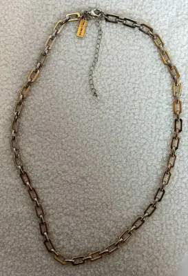 Sale Photo Thumbnail #20: The Limited Goldtone Paperclip Chain Necklace 22-25 in
This is a stylish goldtone paperclip chain necklace from The Limited, measuring 22-25 inches in length. It features lobster closure and is made of goldtone mixed metal, giving it a luxurious look. The
