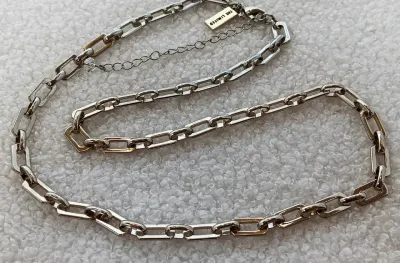 Sale Photo Thumbnail #15: The Limited Goldtone Paperclip Chain Necklace 22-25 in
This is a stylish goldtone paperclip chain necklace from The Limited, measuring 22-25 inches in length. It features lobster closure and is made of goldtone mixed metal, giving it a luxurious look. The