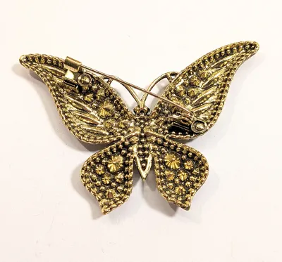 **NEW ARRIVAL** Very GREEN BUTTERFLY BROOCH (2½" x 2") with Green "Slender Marquise Cut" Accent Stones on a Gold Tone...