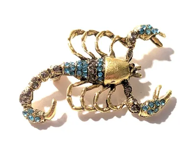 **NEW ARRIVAL** BLUE STONES Gold Colored SCORPION BROOCH (2" x 1¼") with Jeweled Claws and Tail on a "BRASS" Tone...