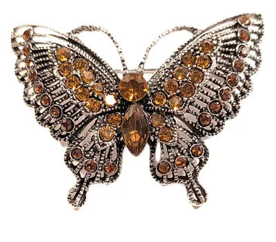 **NEW ARRIVAL** Medium Size AMBER JEWELED BUTTERFLY BROOCH (2" x 1½") with Rows of Amber Stones and Silver Colored Wings on a...