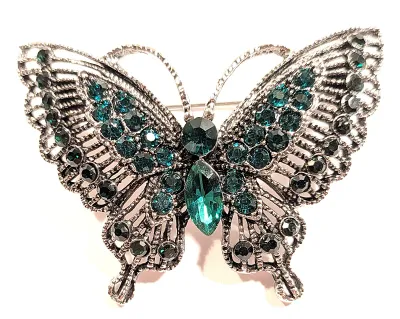**NEW ARRIVAL** Medium Size GREEN JEWELED BUTTERFLY BROOCH (2" x 1½") with Rows of Green Stones and Silver Colored Wings on a...