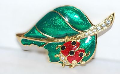 Beautiful Enameled RED LADY BUG BROOCH (2" x 1¼") with Bejeweled STEM & Chewed GREEN LEAF on a Gold Tone Setting