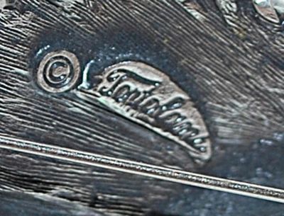 Looped Edge Silver Colored BROOCH (2¼" x 1¼") Marked "© Tortolam" - on a Silver Tone Setting