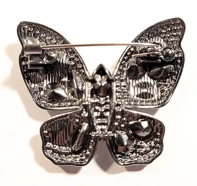 **NEW ARRIVAL** All CLEAR STONES BUTTERFLY BROOCH (1¾" x 1½") with Large Clear Teardrop Beveled Stones and Tiny Accent Body...