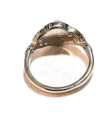 **NEW ARRIVAL** Size 7 Round PINK-ish (Changes Colors) IRIDESCENT STONE RING with a "Split Heart Band" on a Silver Tone Setting...